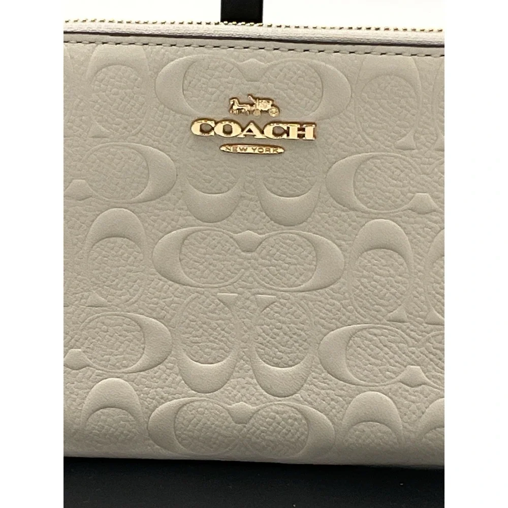 Coach Embossed Corner Zip Wristlet In Chalk With (2) Charms (see Description)